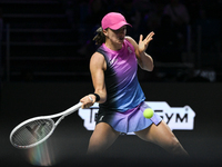 RIYADH, SAUDI ARABIA - NOVEMBER 07: Iga Swiatek of Poland during her match against Daria Kasatkina, on Day 6 of the 2024 WTA Finals, part of...