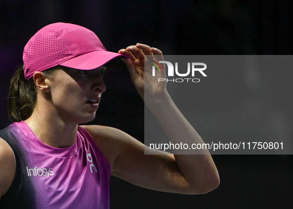 RIYADH, SAUDI ARABIA - NOVEMBER 07: Iga Swiatek of Poland during her match against Daria Kasatkina, on Day 6 of the 2024 WTA Finals, part of...