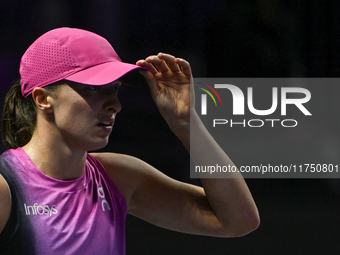 RIYADH, SAUDI ARABIA - NOVEMBER 07: Iga Swiatek of Poland during her match against Daria Kasatkina, on Day 6 of the 2024 WTA Finals, part of...