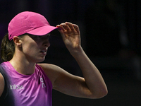 RIYADH, SAUDI ARABIA - NOVEMBER 07: Iga Swiatek of Poland during her match against Daria Kasatkina, on Day 6 of the 2024 WTA Finals, part of...