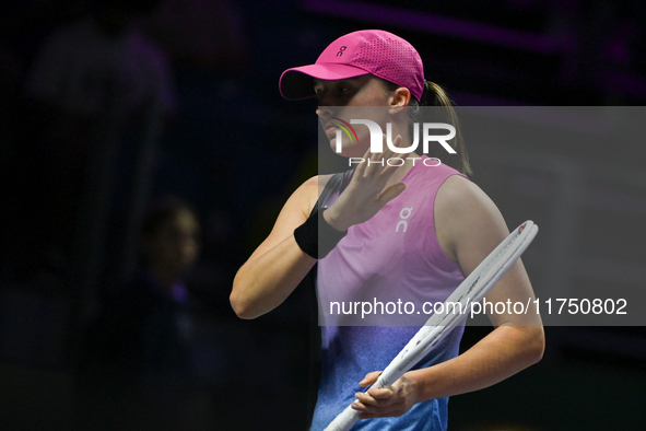 RIYADH, SAUDI ARABIA - NOVEMBER 07: Iga Swiatek of Poland during her match against Daria Kasatkina, on Day 6 of the 2024 WTA Finals, part of...