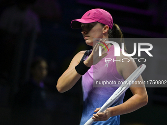 RIYADH, SAUDI ARABIA - NOVEMBER 07: Iga Swiatek of Poland during her match against Daria Kasatkina, on Day 6 of the 2024 WTA Finals, part of...