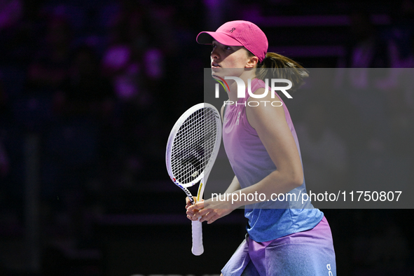 RIYADH, SAUDI ARABIA - NOVEMBER 07: Iga Swiatek of Poland during her match against Daria Kasatkina, on Day 6 of the 2024 WTA Finals, part of...