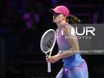 RIYADH, SAUDI ARABIA - NOVEMBER 07: Iga Swiatek of Poland during her match against Daria Kasatkina, on Day 6 of the 2024 WTA Finals, part of...