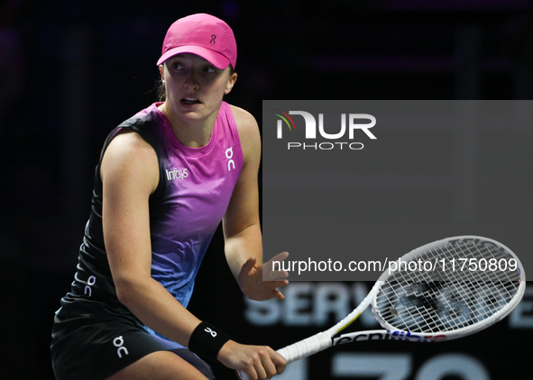 RIYADH, SAUDI ARABIA - NOVEMBER 07: Iga Swiatek of Poland during her match against Daria Kasatkina, on Day 6 of the 2024 WTA Finals, part of...