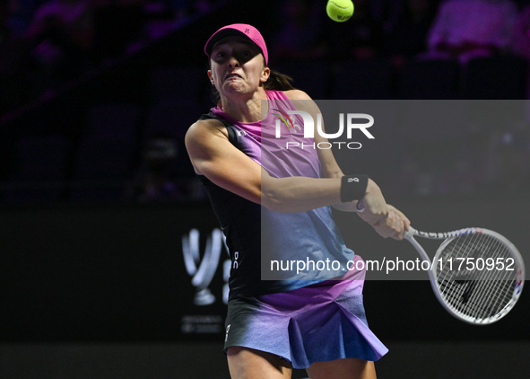 RIYADH, SAUDI ARABIA - NOVEMBER 07: Iga Swiatek of Poland during her match against Daria Kasatkina, on Day 6 of the 2024 WTA Finals, part of...