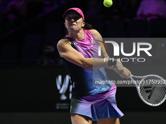 RIYADH, SAUDI ARABIA - NOVEMBER 07: Iga Swiatek of Poland during her match against Daria Kasatkina, on Day 6 of the 2024 WTA Finals, part of...