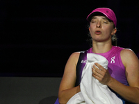 RIYADH, SAUDI ARABIA - NOVEMBER 07: Iga Swiatek of Poland during her match against Daria Kasatkina, on Day 6 of the 2024 WTA Finals, part of...