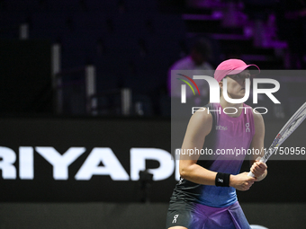 RIYADH, SAUDI ARABIA - NOVEMBER 07: Iga Swiatek of Poland during her match against Daria Kasatkina, on Day 6 of the 2024 WTA Finals, part of...