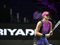 RIYADH, SAUDI ARABIA - NOVEMBER 07: Iga Swiatek of Poland during her match against Daria Kasatkina, on Day 6 of the 2024 WTA Finals, part of...