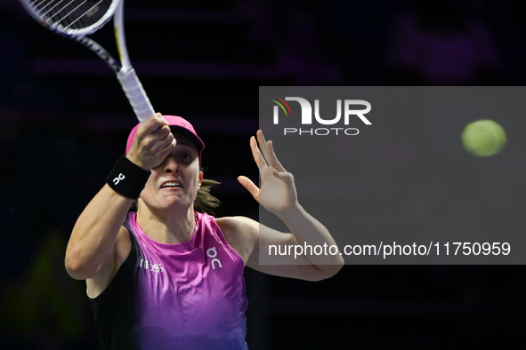 RIYADH, SAUDI ARABIA - NOVEMBER 07: Iga Swiatek of Poland during her match against Daria Kasatkina, on Day 6 of the 2024 WTA Finals, part of...