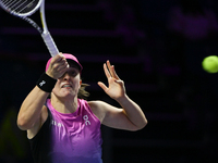 RIYADH, SAUDI ARABIA - NOVEMBER 07: Iga Swiatek of Poland during her match against Daria Kasatkina, on Day 6 of the 2024 WTA Finals, part of...