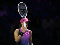 RIYADH, SAUDI ARABIA - NOVEMBER 07: Iga Swiatek of Poland during her match against Daria Kasatkina, on Day 6 of the 2024 WTA Finals, part of...