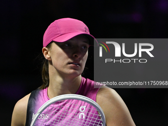 RIYADH, SAUDI ARABIA - NOVEMBER 07: Iga Swiatek of Poland during her match against Daria Kasatkina, on Day 6 of the 2024 WTA Finals, part of...