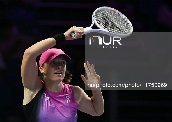 RIYADH, SAUDI ARABIA - NOVEMBER 07: Iga Swiatek of Poland during her match against Daria Kasatkina, on Day 6 of the 2024 WTA Finals, part of...