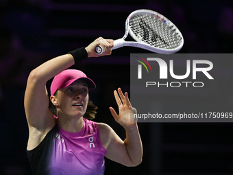 RIYADH, SAUDI ARABIA - NOVEMBER 07: Iga Swiatek of Poland during her match against Daria Kasatkina, on Day 6 of the 2024 WTA Finals, part of...