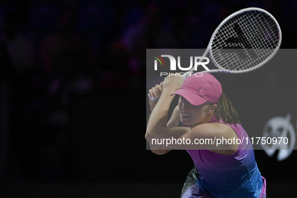 RIYADH, SAUDI ARABIA - NOVEMBER 07: Iga Swiatek of Poland during her match against Daria Kasatkina, on Day 6 of the 2024 WTA Finals, part of...