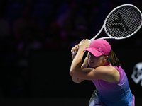 RIYADH, SAUDI ARABIA - NOVEMBER 07: Iga Swiatek of Poland during her match against Daria Kasatkina, on Day 6 of the 2024 WTA Finals, part of...