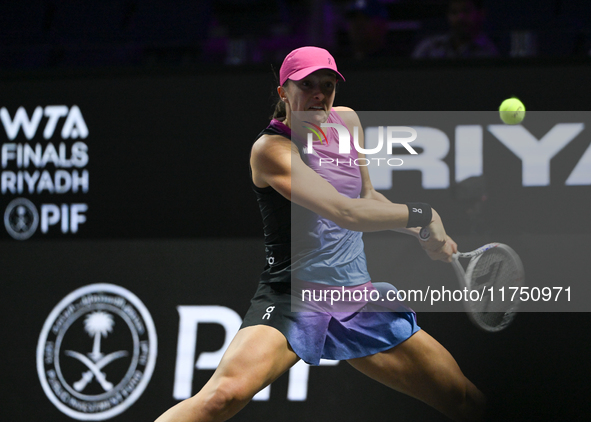 RIYADH, SAUDI ARABIA - NOVEMBER 07: Iga Swiatek of Poland during her match against Daria Kasatkina, on Day 6 of the 2024 WTA Finals, part of...