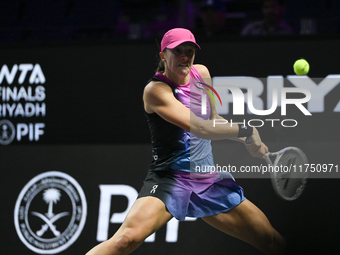 RIYADH, SAUDI ARABIA - NOVEMBER 07: Iga Swiatek of Poland during her match against Daria Kasatkina, on Day 6 of the 2024 WTA Finals, part of...