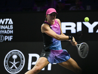 RIYADH, SAUDI ARABIA - NOVEMBER 07: Iga Swiatek of Poland during her match against Daria Kasatkina, on Day 6 of the 2024 WTA Finals, part of...