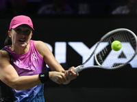 RIYADH, SAUDI ARABIA - NOVEMBER 07: Iga Swiatek of Poland during her match against Daria Kasatkina, on Day 6 of the 2024 WTA Finals, part of...