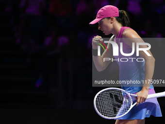 RIYADH, SAUDI ARABIA - NOVEMBER 07: Iga Swiatek of Poland during her match against Daria Kasatkina, on Day 6 of the 2024 WTA Finals, part of...