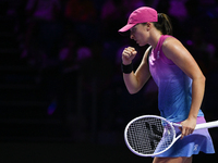 RIYADH, SAUDI ARABIA - NOVEMBER 07: Iga Swiatek of Poland during her match against Daria Kasatkina, on Day 6 of the 2024 WTA Finals, part of...