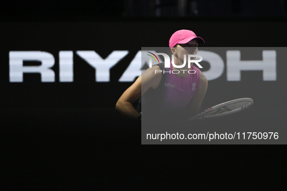 RIYADH, SAUDI ARABIA - NOVEMBER 07: Iga Swiatek of Poland during her match against Daria Kasatkina, on Day 6 of the 2024 WTA Finals, part of...