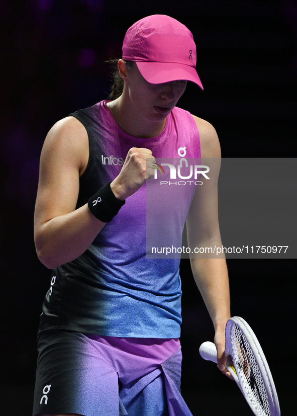 RIYADH, SAUDI ARABIA - NOVEMBER 07: Iga Swiatek of Poland during her match against Daria Kasatkina, on Day 6 of the 2024 WTA Finals, part of...