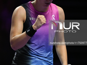 RIYADH, SAUDI ARABIA - NOVEMBER 07: Iga Swiatek of Poland during her match against Daria Kasatkina, on Day 6 of the 2024 WTA Finals, part of...