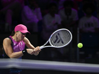 RIYADH, SAUDI ARABIA - NOVEMBER 07: Iga Swiatek of Poland during her match against Daria Kasatkina, on Day 6 of the 2024 WTA Finals, part of...