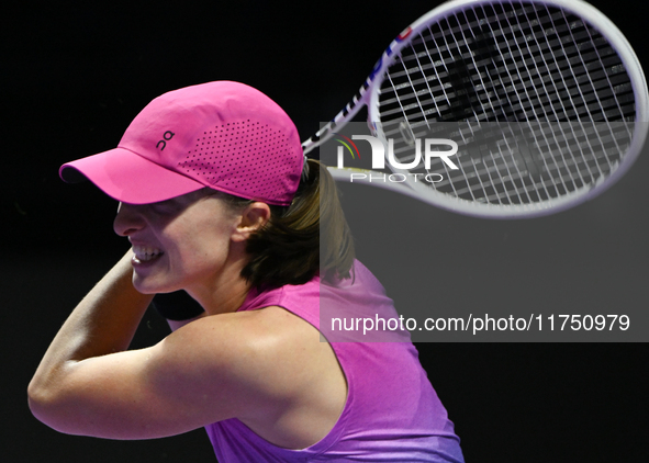 RIYADH, SAUDI ARABIA - NOVEMBER 07: Iga Swiatek of Poland during her match against Daria Kasatkina, on Day 6 of the 2024 WTA Finals, part of...