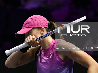 RIYADH, SAUDI ARABIA - NOVEMBER 07: Iga Swiatek of Poland during her match against Daria Kasatkina, on Day 6 of the 2024 WTA Finals, part of...