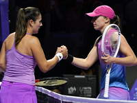 RIYADH, SAUDI ARABIA - NOVEMBER 07: Daria Kasatkina congratulates Iga Swiatek of Poland after their match, on Day 6 of the 2024 WTA Finals,...