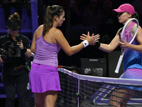 RIYADH, SAUDI ARABIA - NOVEMBER 07: Daria Kasatkina congratulates Iga Swiatek of Poland after their match, on Day 6 of the 2024 WTA Finals,...