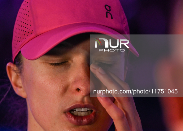 RIYADH, SAUDI ARABIA - NOVEMBER 07: Iga Swiatek of Poland during her match against Daria Kasatkina, on Day 6 of the 2024 WTA Finals, part of...