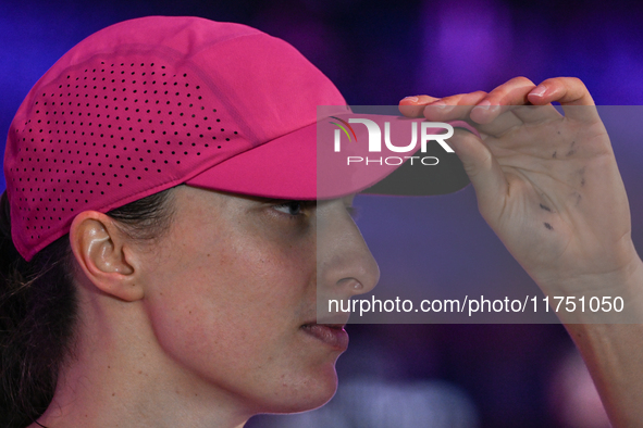 RIYADH, SAUDI ARABIA - NOVEMBER 07: Iga Swiatek of Poland during her match against Daria Kasatkina, on Day 6 of the 2024 WTA Finals, part of...