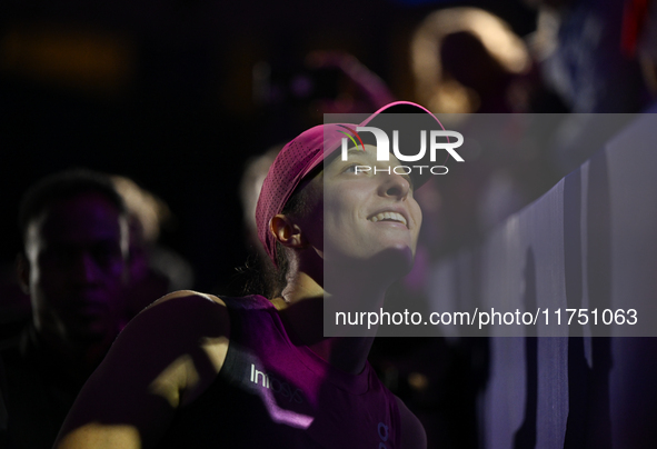 RIYADH, SAUDI ARABIA - NOVEMBER 07: Iga Swiatek of Poland meets with fans after her match against Daria Kasatkina, on Day 6 of the 2024 WTA...