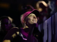 RIYADH, SAUDI ARABIA - NOVEMBER 07: Iga Swiatek of Poland meets with fans after her match against Daria Kasatkina, on Day 6 of the 2024 WTA...