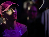 RIYADH, SAUDI ARABIA - NOVEMBER 07: Iga Swiatek of Poland meets with fans after her match against Daria Kasatkina, on Day 6 of the 2024 WTA...