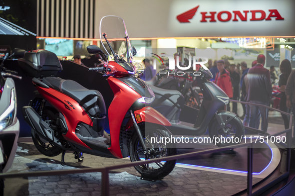 The HONDA SH350 MY 2025 is at the 110th International Motorcycle and Accessories Exhibition 2024 at Fiera Milano Rho in Milan, Italy, on Nov...