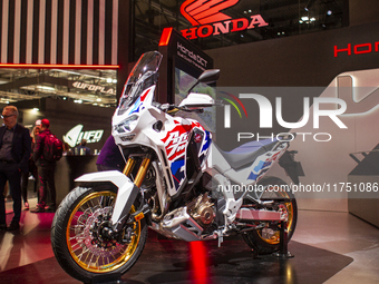 The Honda Africa Twin is at the 110th International Motorcycle and Accessories Exhibition 2024 at Fiera Milano Rho in Milan, Italy, on Novem...