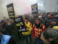 Protesters hold a placard that reads ''Stop taxing!'', ''No to taxation of horse-race betting!'' and ''Let's save the horse! our jobs and ou...