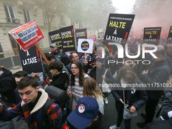 Protesters hold a placard that reads ''Stop taxing!'', ''No to taxation of horse-race betting!'' and ''Let's save the horse! our jobs and ou...