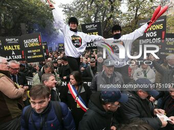 Protesters hold a placard that reads ''Stop taxing!'', ''No to taxation of horse-race betting!'' and ''Let's save the horse! our jobs and ou...