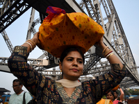 Hindu women devotees arrive at Ganga Ghat during the Hindu festival Chhath in Kolkata, India, on November 7, 2024. The 'Chhath' festival is...