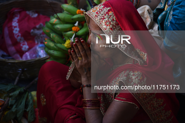 Hindu women devotees perform rituals during the Hindu festival Chhath in Kolkata, India, on November 7, 2024. The 'Chhath' festival is mostl...