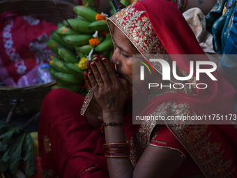 Hindu women devotees perform rituals during the Hindu festival Chhath in Kolkata, India, on November 7, 2024. The 'Chhath' festival is mostl...