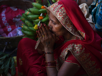 Hindu women devotees perform rituals during the Hindu festival Chhath in Kolkata, India, on November 7, 2024. The 'Chhath' festival is mostl...